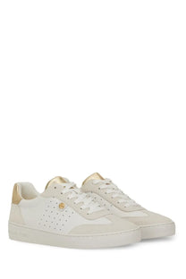 Michael Kors women’s white leather sneaker Scotty yellow with gold-tone accents and perforated detailing