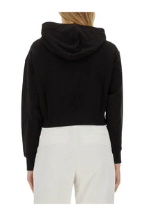 Michael Kors women’s black cropped hoodie with soft relaxed fit and ribbed cuffs perfect for casual wear