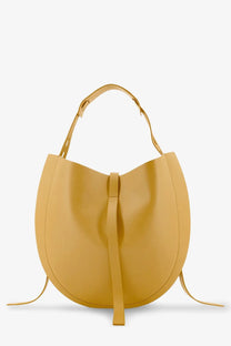 A sleek mustard-yellow leather Minobossi women’s Liz crossbody bag with minimalist design and matching shoulder strap