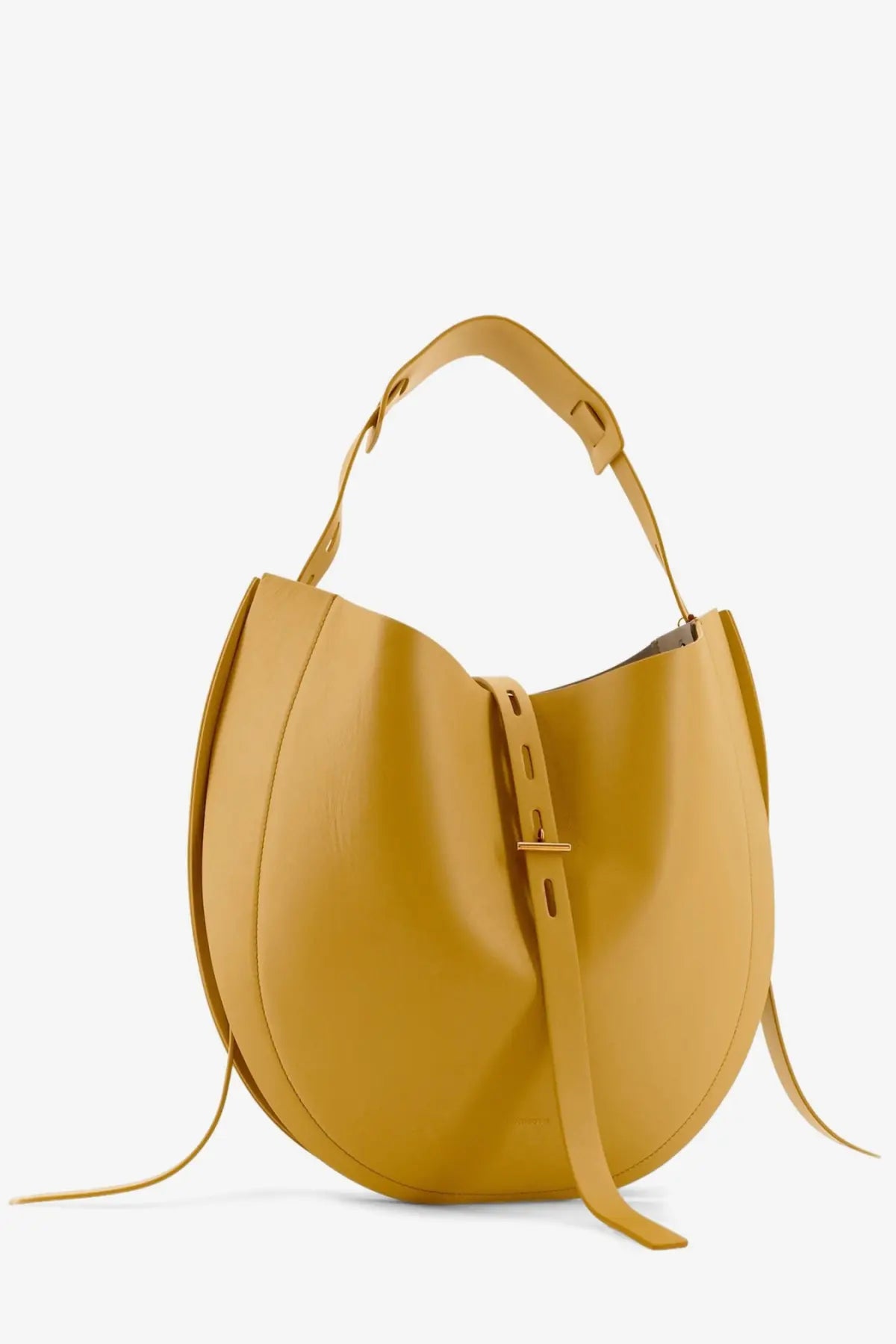 A sleek mustard-yellow leather hobo bag with curved silhouette and minimalist gold-tone hardware by Minobossi