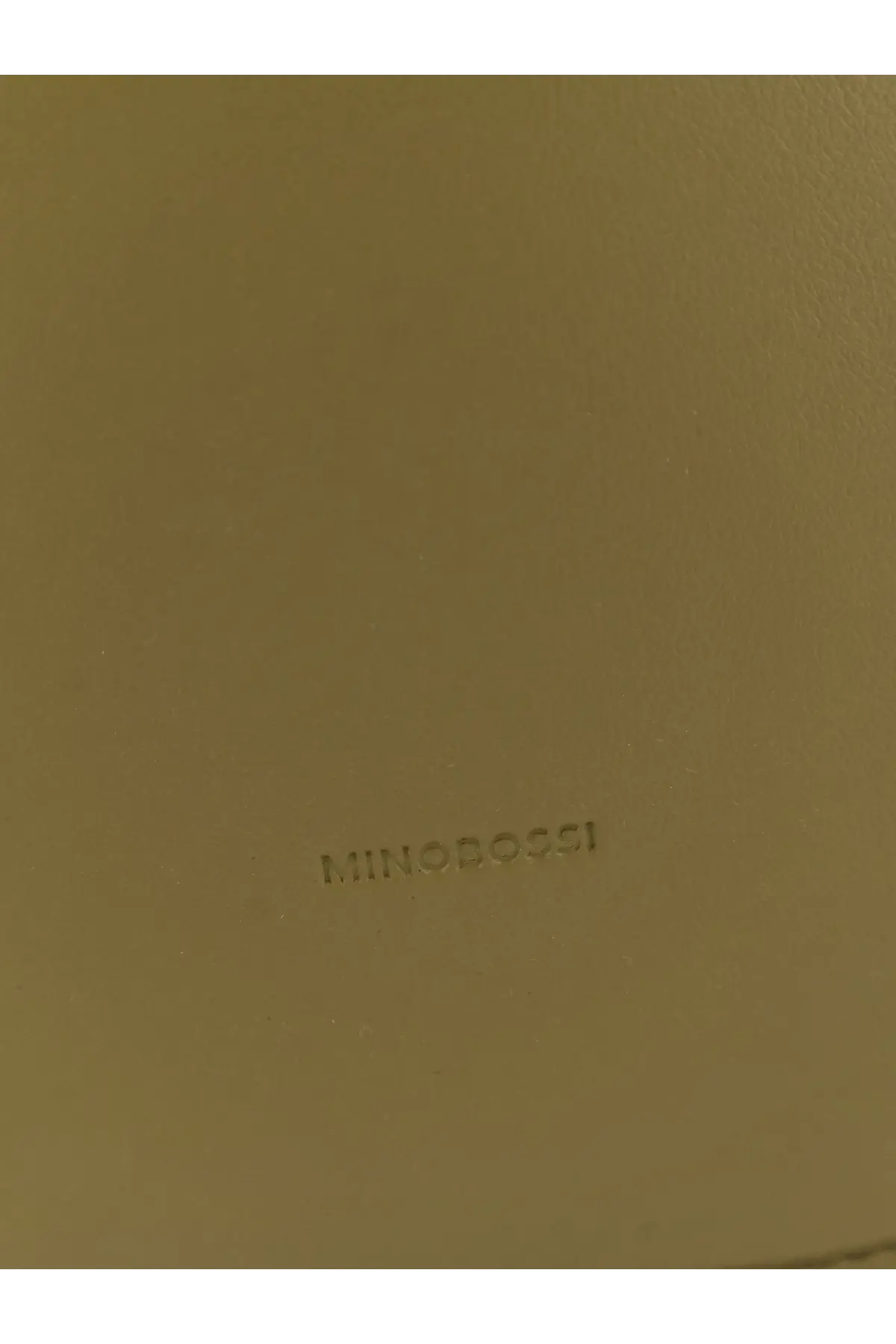 A matte olive green leather notebook with embossed minonocchi branding paired with a Minobossi Lizzie leather crossbody bag