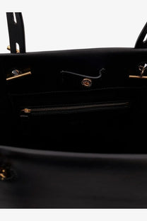 Minobossi women’s Paula black leather shoulder bag with gold-tone hardware and central zipper compartment