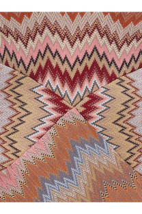 A knitted scarf with a bold zigzag pattern in pink red beige and gray complementing missoni women’s long viscose dress brown