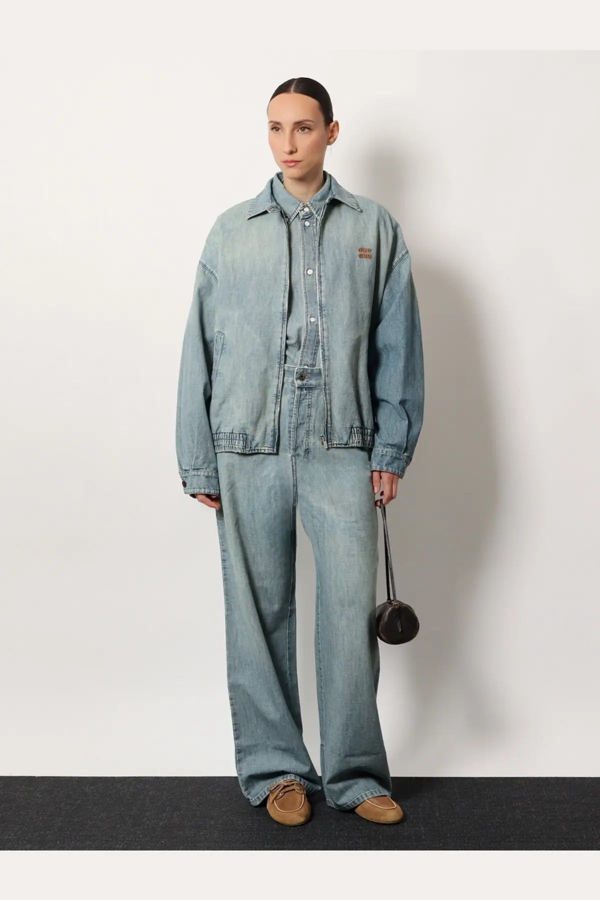 Miu miu women’s cotton jeans blue light-wash denim jacket with relaxed oversized fit and subtle stitching details