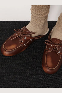 Miu Miu women’s Élavé leather sabot beige brown leather boat shoes with matching laces and silver eyelets