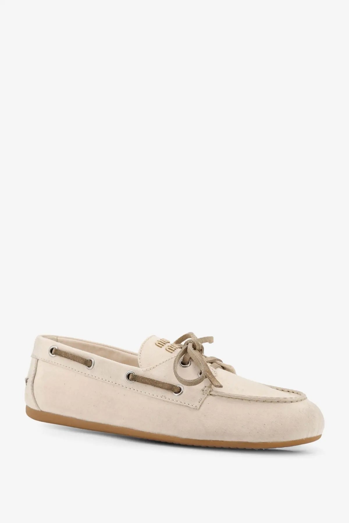 Cream-colored suede Miu Miu women’s fabric loafers with matching laces and tan rubber sole white boat shoe