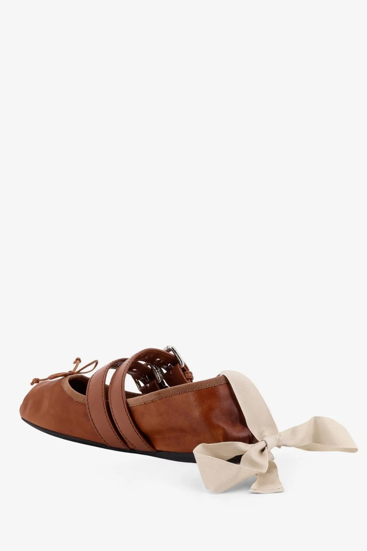 Miu Miu women’s beige leather ballerinas with brown ballet flat design, beige ribbon ties, and metallic buckle accents