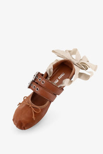 Miu Miu women’s beige leather ballerinas with brown mary jane style, beige ribbon ties, and silver-toned buckle details