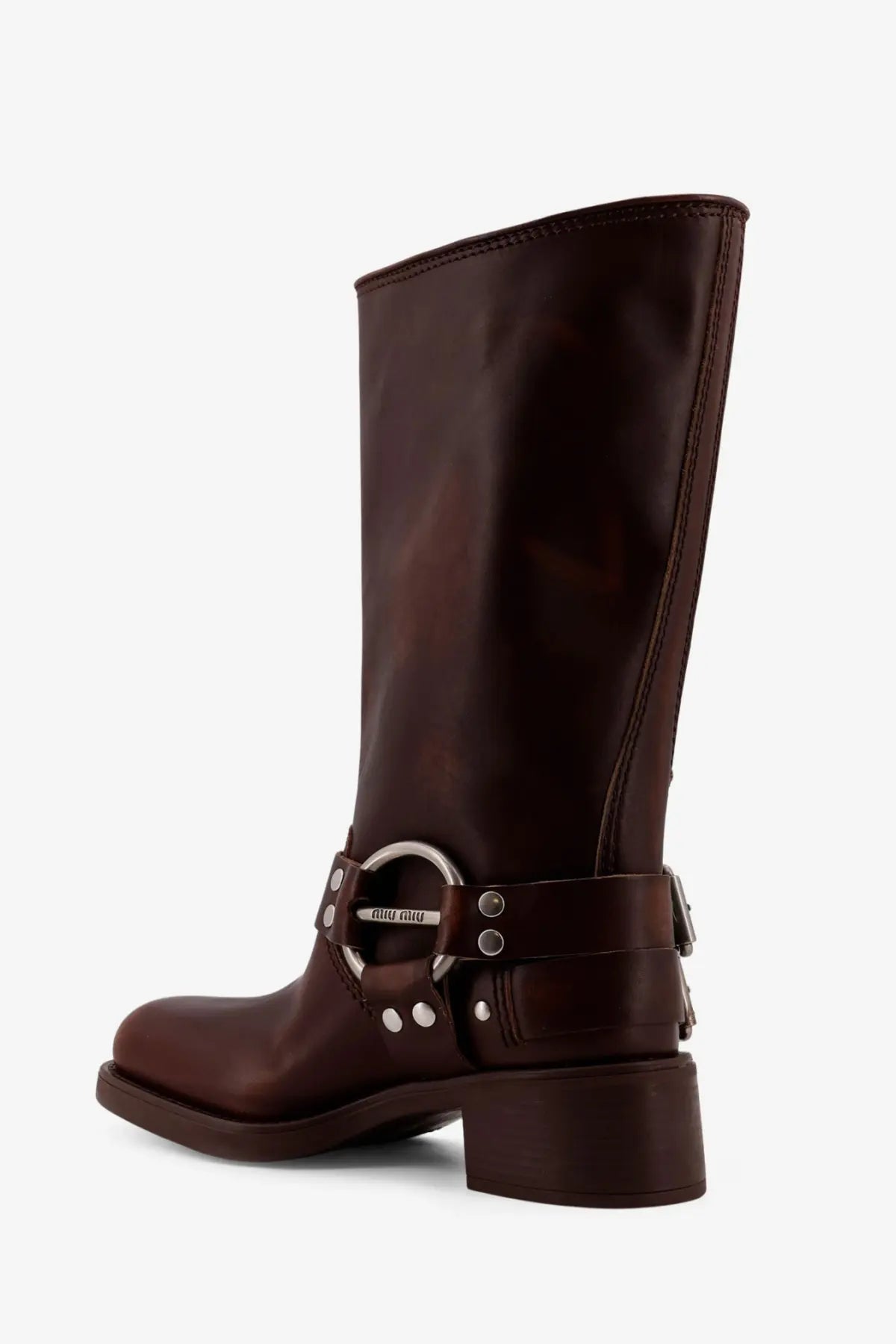 Miu Miu women’s dark brown leather boots with a silver-toned buckle and rivets detailing