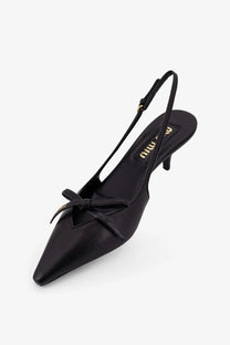 Miu Miu women’s black leather slingback pump with pointed toe and decorative bow at the front