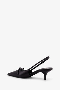 Miu Miu women’s black leather slingback pump with pointed toe and small bow detail at the front