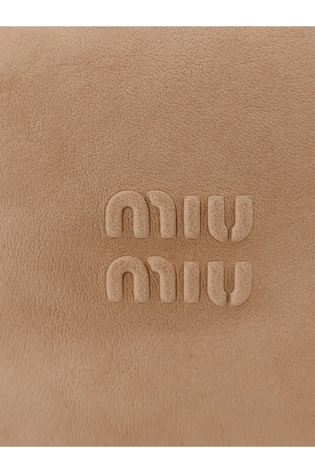 Tan leather pouch handbag with embossed miu miu logo in beige for women