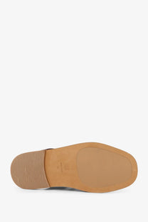 Miu Miu women’s brown leather sandals showing tan leather sole with smooth textured surface and visible stitching