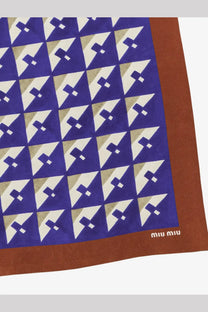 Miu Miu women’s multicolor silk scarf with bold navy blue cream and beige geometric triangles and rust border