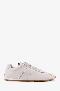 Miu Miu women’s plume leather sneakers in white with off-white leather, dotted stitching, and tan rubber sole