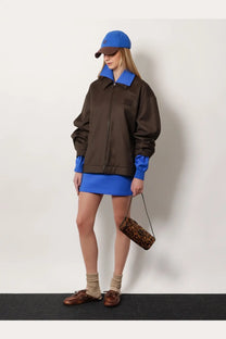Blue and brown color-block bomber jacket with recycled material mini skirt blue by miu miu featuring contrasting collar cuffs and zipper