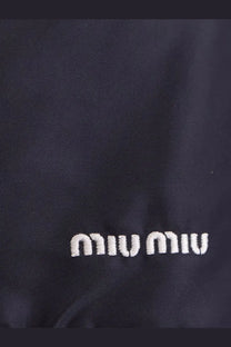 Dark navy recycled material mini skirt with white embroidered miu miu logo by miu miu women