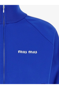 Bright royal blue miu miu women’s zip-up track jacket with white embroidered logo and ribbed collar made from recycled material