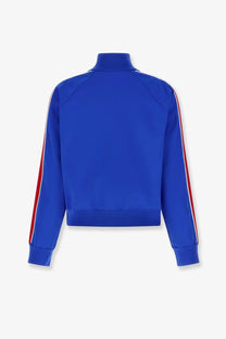 Miu Miu women’s recycled material vibrant royal blue cropped track jacket with bold red and white striped sleeves