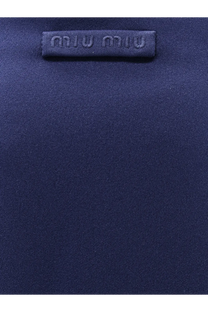 Dark blue miu miu fabric label with embossed logo on miu miu women’s baltico skirt