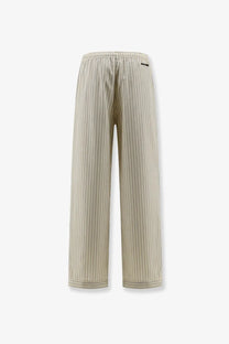 Miu Miu women’s white striped cotton pajama pants with beige and gray vertical wide-leg stripes and elastic waistband