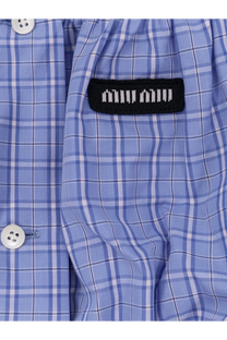 Miu Miu women’s blue and white plaid cotton button-up shirt with black woven label on the pocket