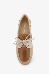 Beige and tan suede boat shoe with lace-up front from miu miu women’s suede loafer white collection
