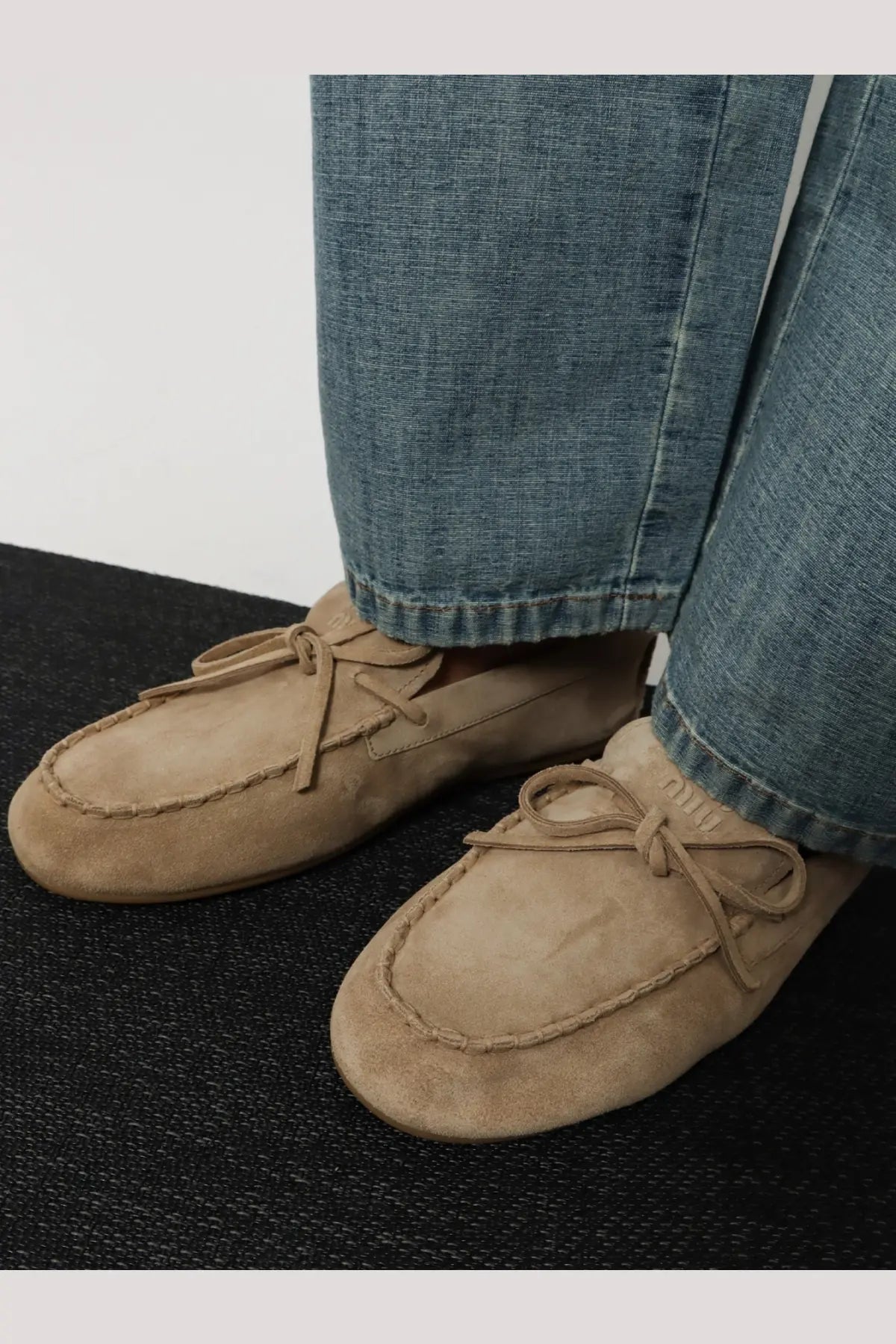 Beige suede moccasin loafers with matching laces and stitched detailing from miu miu women’s suede loafers beige collection