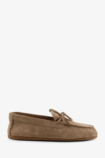 Miu Miu women’s beige suede loafers featuring tan moccasin style with tied bow detail on the vamp