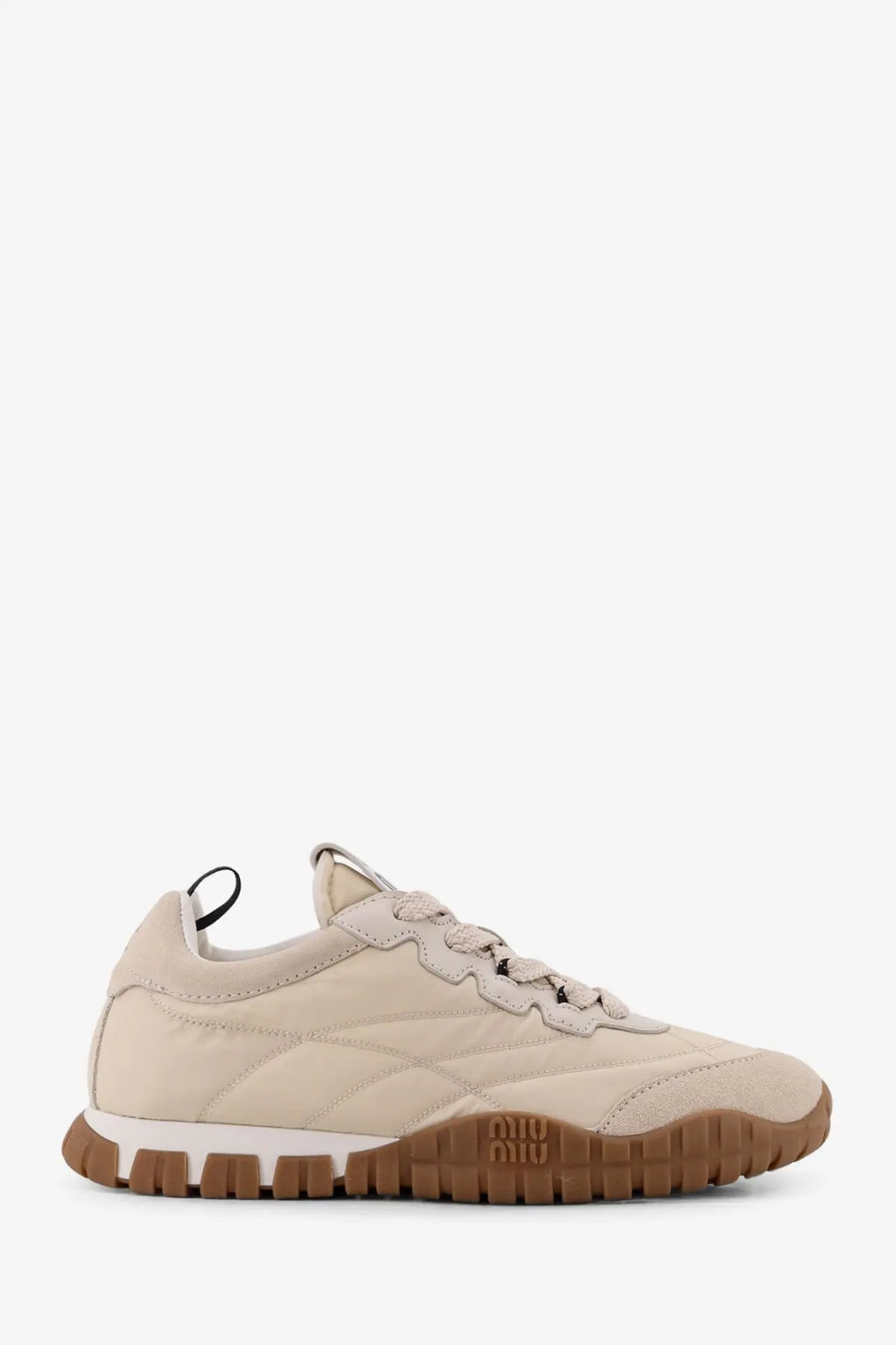Beige suede miu miu women’s tyre sneaker with brown rubber sole white midsole and embossed logo on the back heel