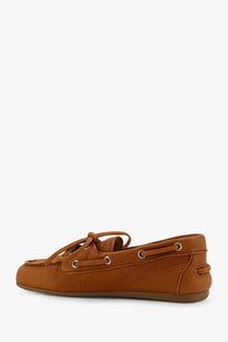 Miu Miu women’s vintage effect leather loafers in orange featuring tan leather boat shoe design with moccasin stitching