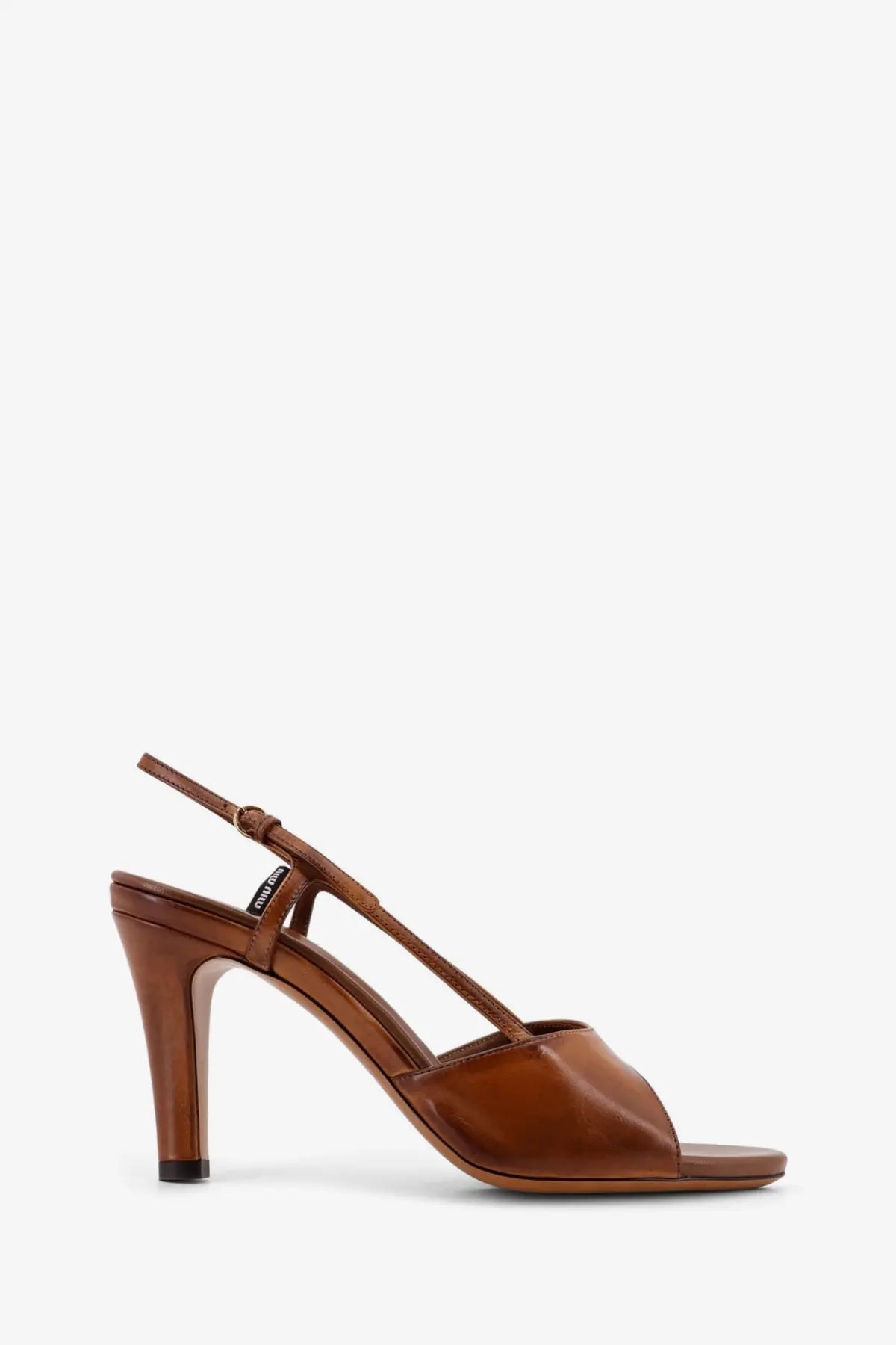 Miu Miu women’s vintage brown leather slingback heel with sleek minimalist design and black-tipped stiletto