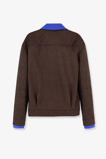 Miu miu women’s virgin wool brown jacket with contrasting blue collar and cuffs visible from the front