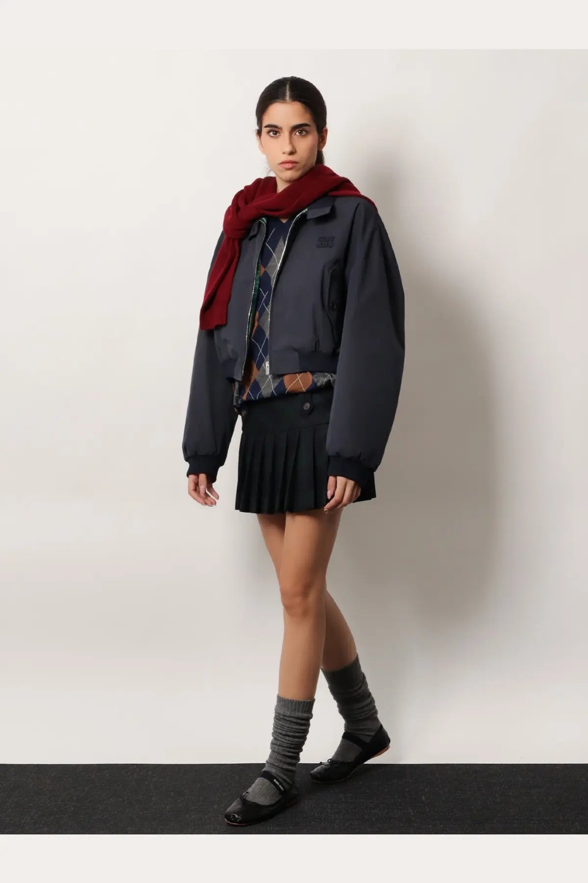 Dark gray bomber jacket with ribbed cuffs and small black patch on left chest for women by miu miu