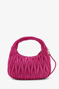 A vibrant fuchsia miu miu women’s wander matelassé suede shoulder bag with quilted texture and top handle