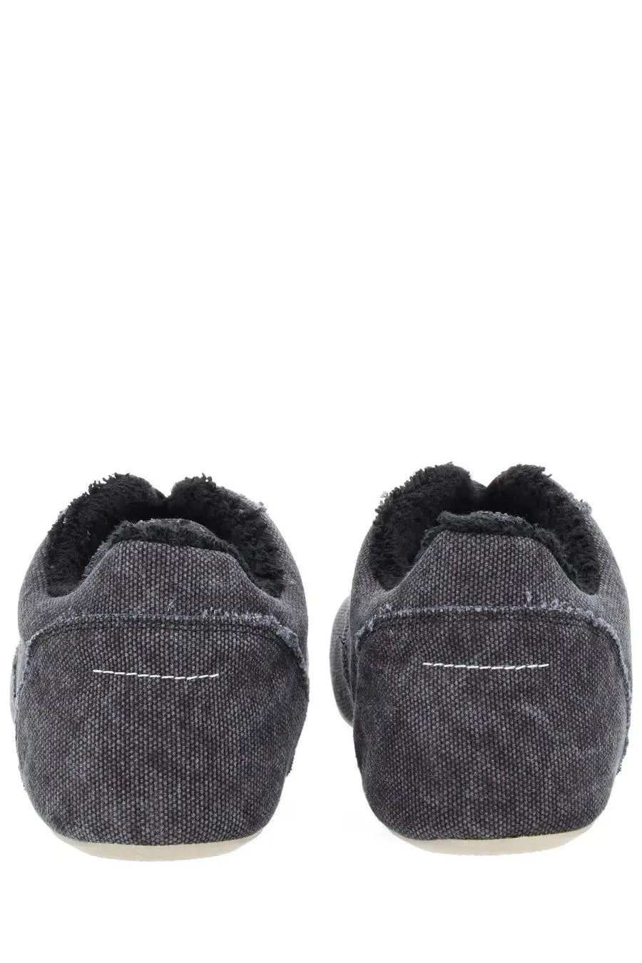 Dark gray mm6 maison margiela men’s anatomical canvas slip-on shoes with black faux fur lining and white stitching details