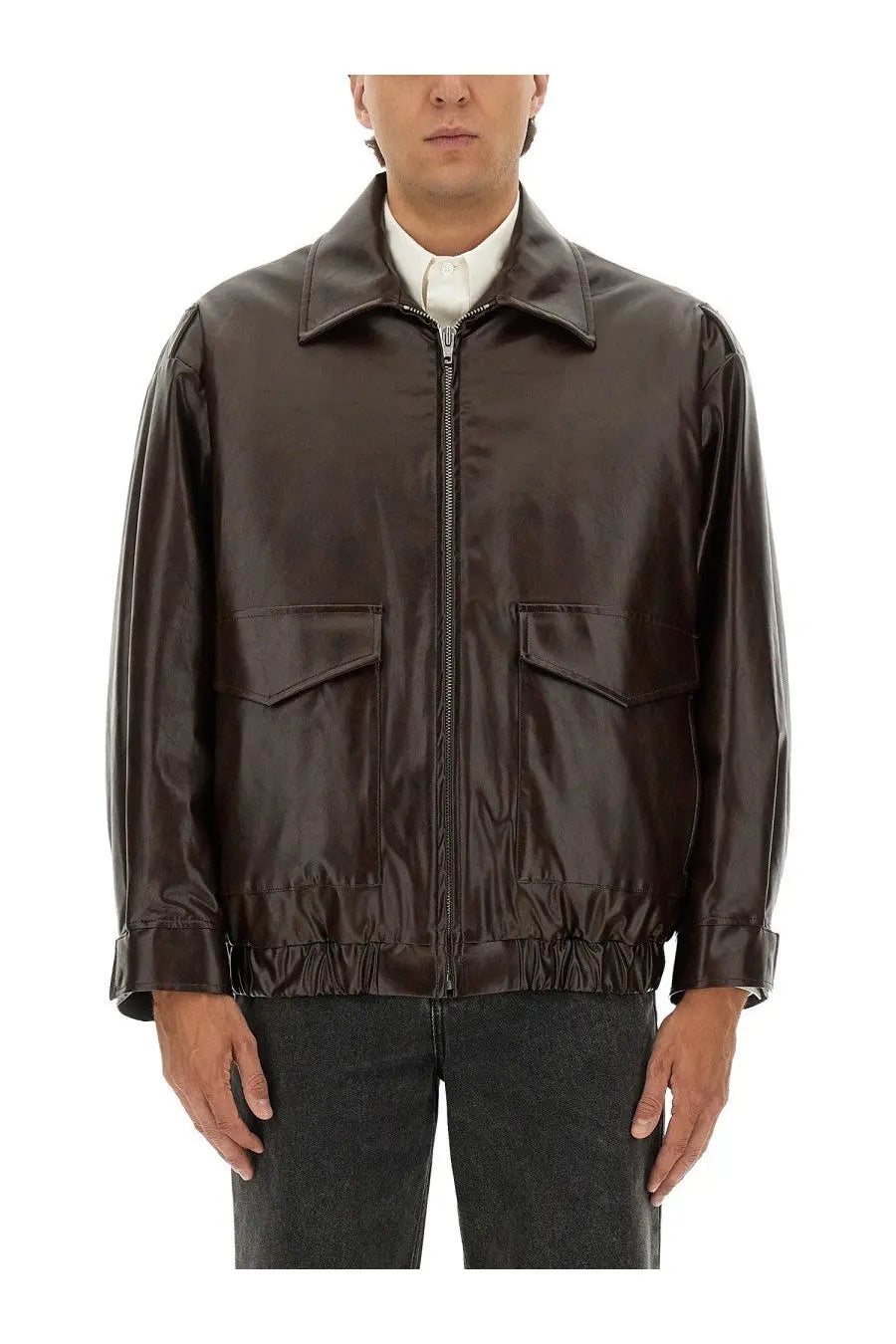 A sleek dark brown faux leather bomber jacket with matte finish and two front flap pockets from MM6 Maison Margiela