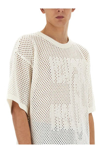 Mm6 maison margiela men’s black shirt featuring a white mesh knit t-shirt with a subtle textured pattern