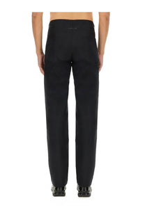 Black tailored mm6 maison margiela men’s straight leg pants with sleek cut and subtle stitching details