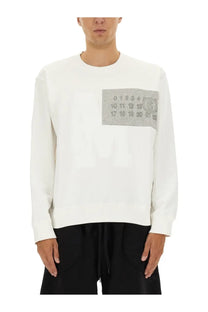 Mm6 Maison Margiela men’s white crewneck sweatshirt with gray stitched patch and stylized 6 logo on chest