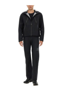 Mm6 maison margiela men’s black hooded jacket with gray lining and subtle zipper details in technical fabric