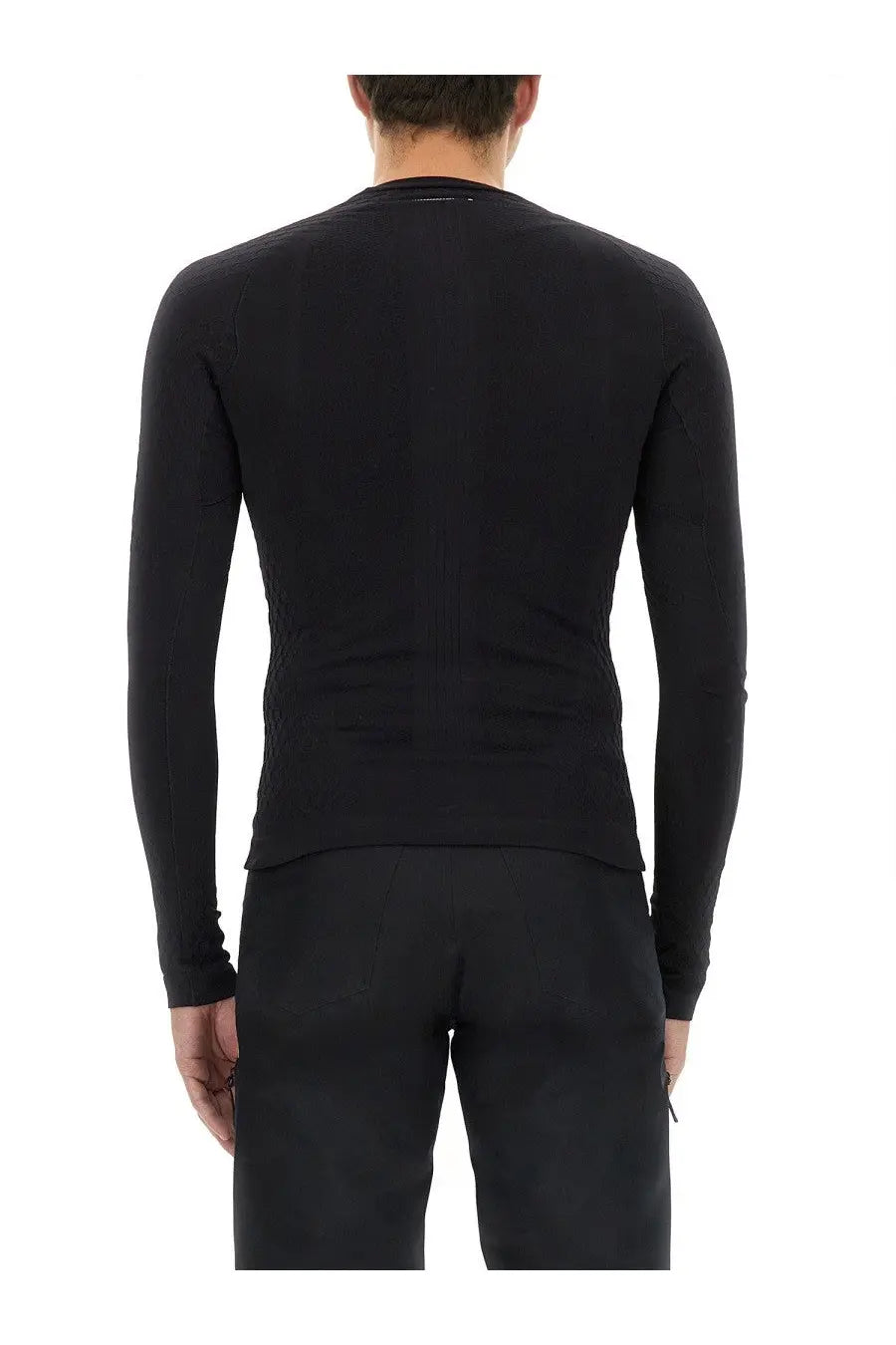 Black long-sleeved fitted seamless performance top made from technical fabric by mm6 maison margiela men