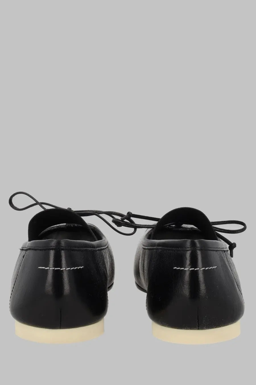 Mm6 maison margiela women’s black patent leather loafers with white stitching and cream-colored soles