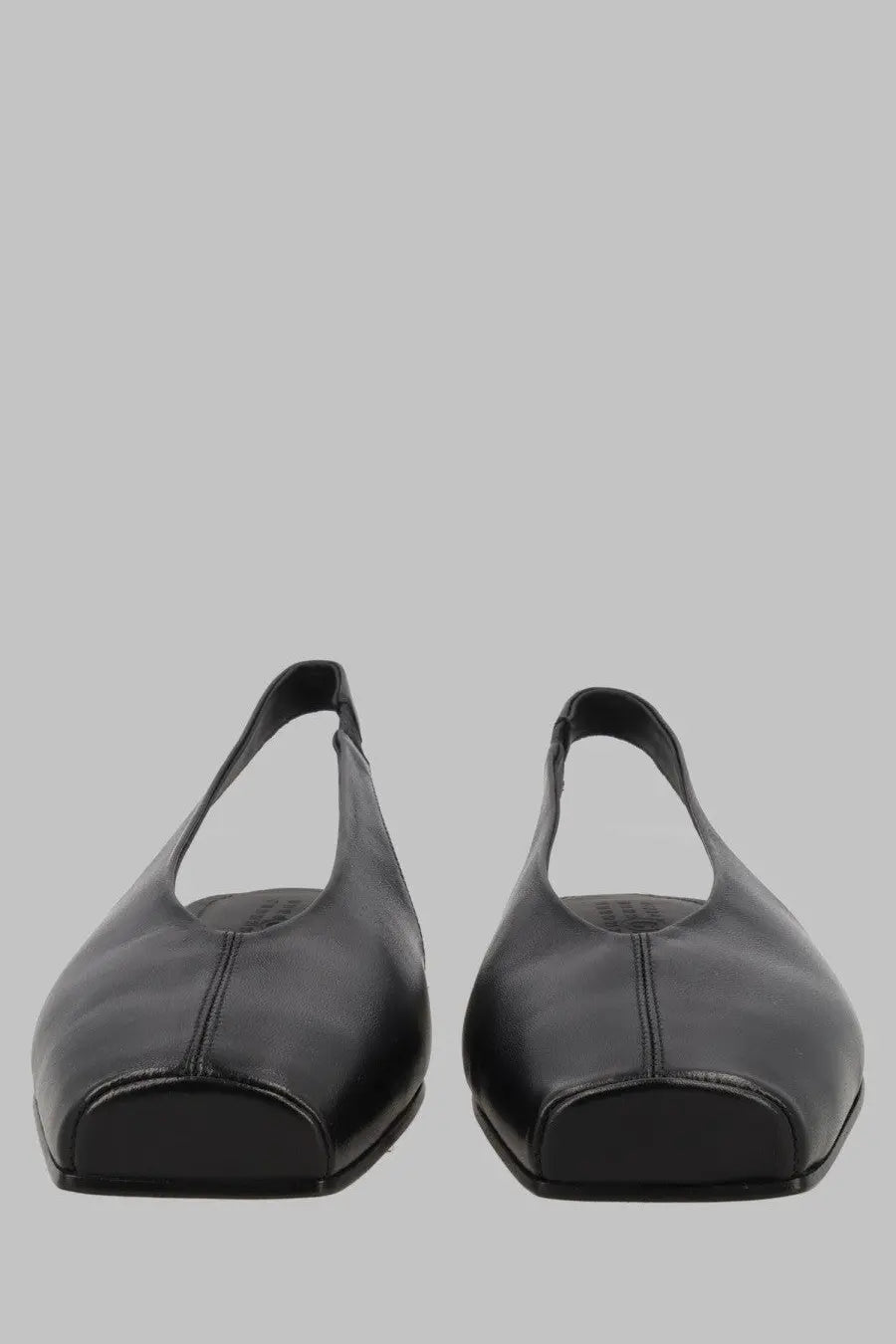 Black leather slingback flats with square toe and minimalist stitching by mm6 maison margiela in pelle black