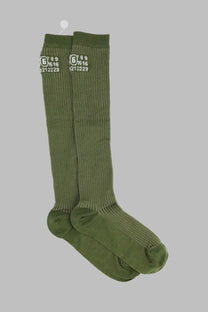 Olive green ribbed knee-high socks with white numerical markings on the cuff by MM6 Maison Margiela women
