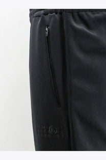 Black mm6 maison margiela women’s cotton blend jogging trousers with subtle textured fabric and side zippered pocket