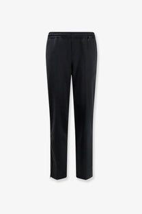 Black tapered MM6 Maison Margiela women’s cotton blend jogging trousers with sleek straight-leg cut and side slits