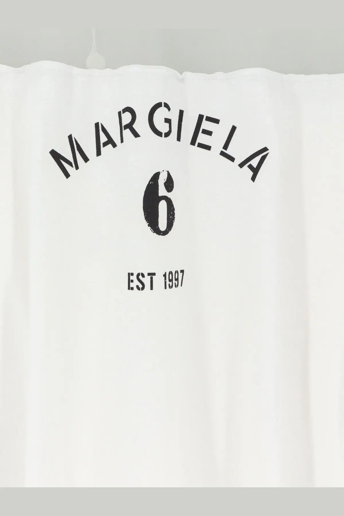 White margiela 6 shower curtain with black printed logo and text in cotton fabric for bathroom use