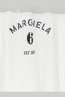 White margiela 6 shower curtain with black printed logo and text in cotton fabric for bathroom use
