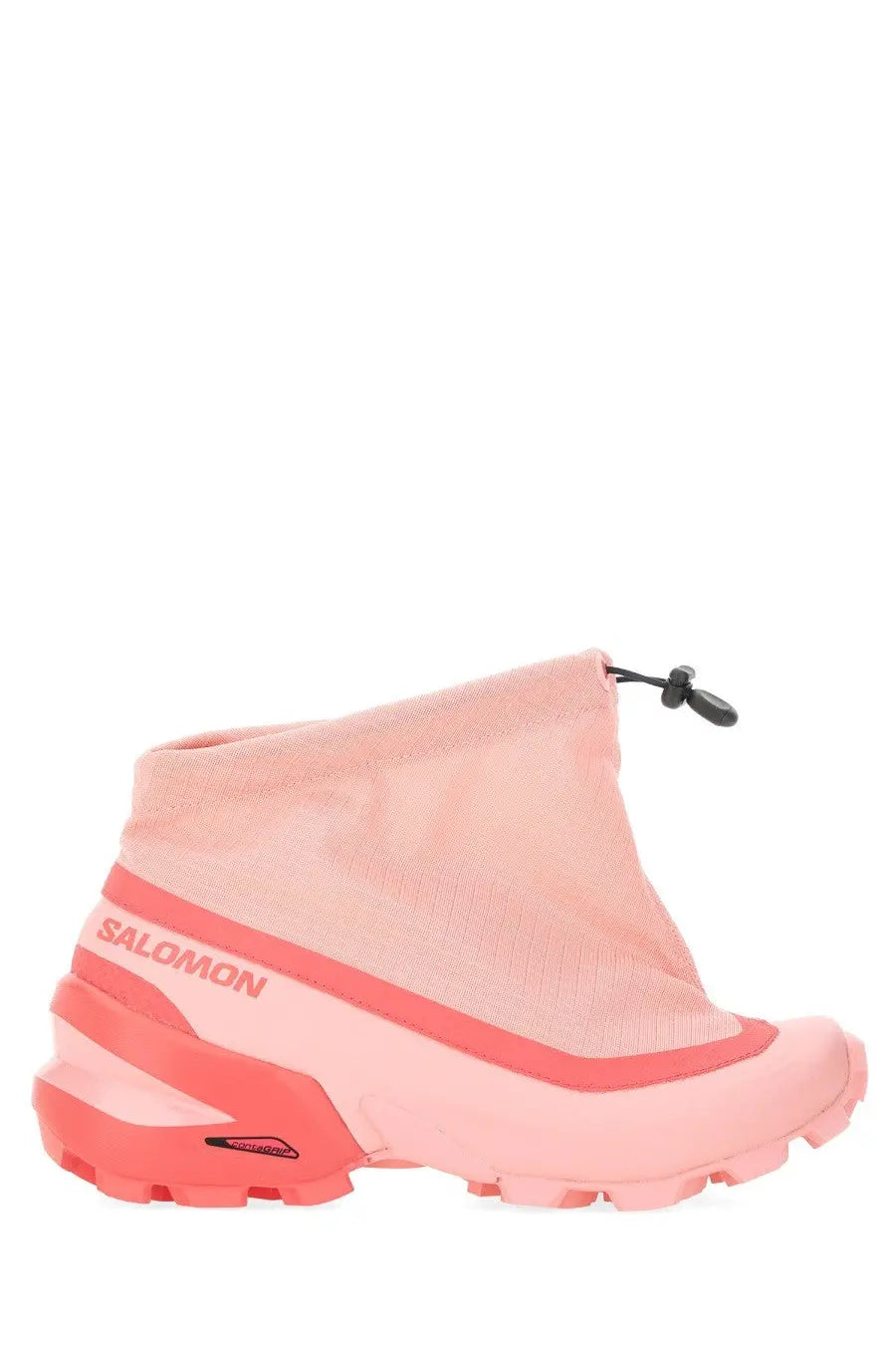 Pink salomon hiking boot with mesh upper and coral accents on midsole and outsole next to mm6 maison margiela cross low sneaker blue